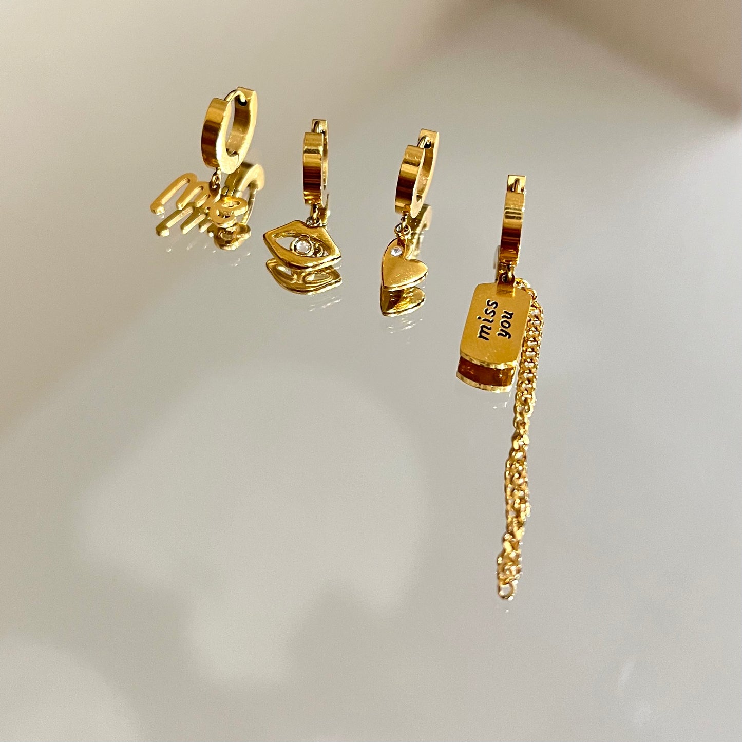 Four huggie hoop earring set